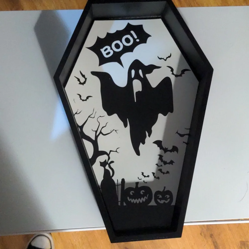 Coffin shaped box shelf display